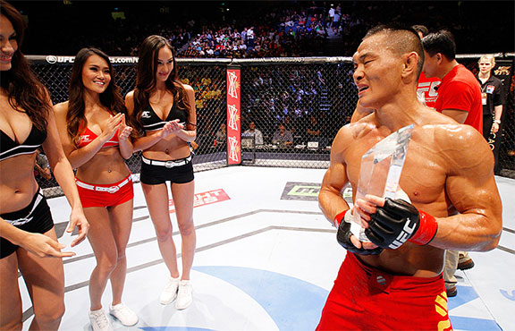 Ning Guangyou celebrating his victory by decision at a recent UFC event in Macau